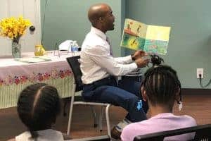 Philip Simmons reading to children