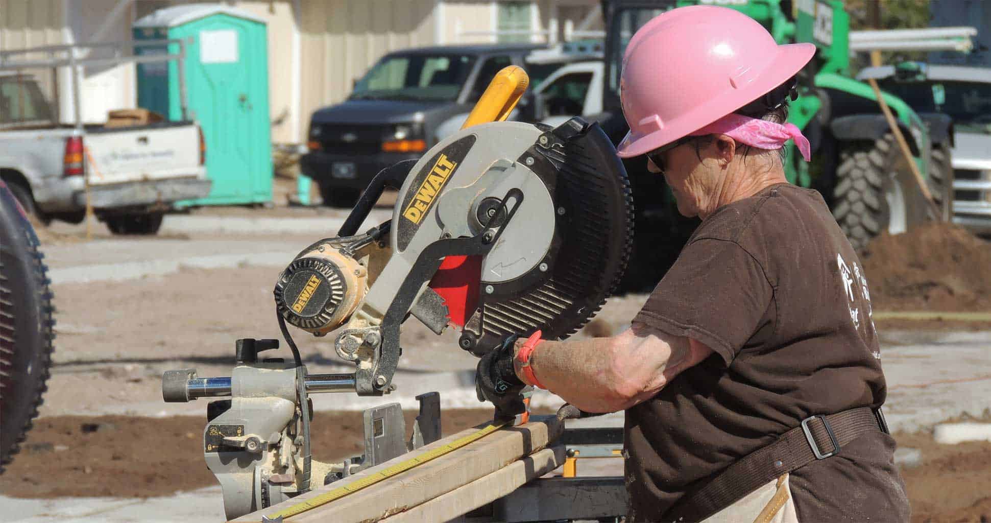 Woman using skill saw