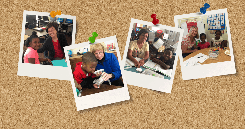 Photos of students and tutors pinned to cork board