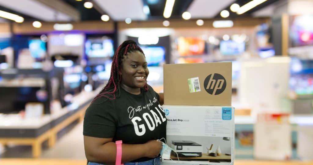 Young woman in electronics store