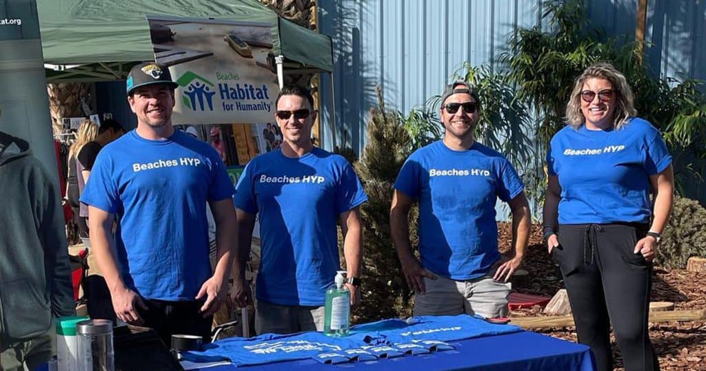 3 Young Adults wearing blue Beaches HYP shirts