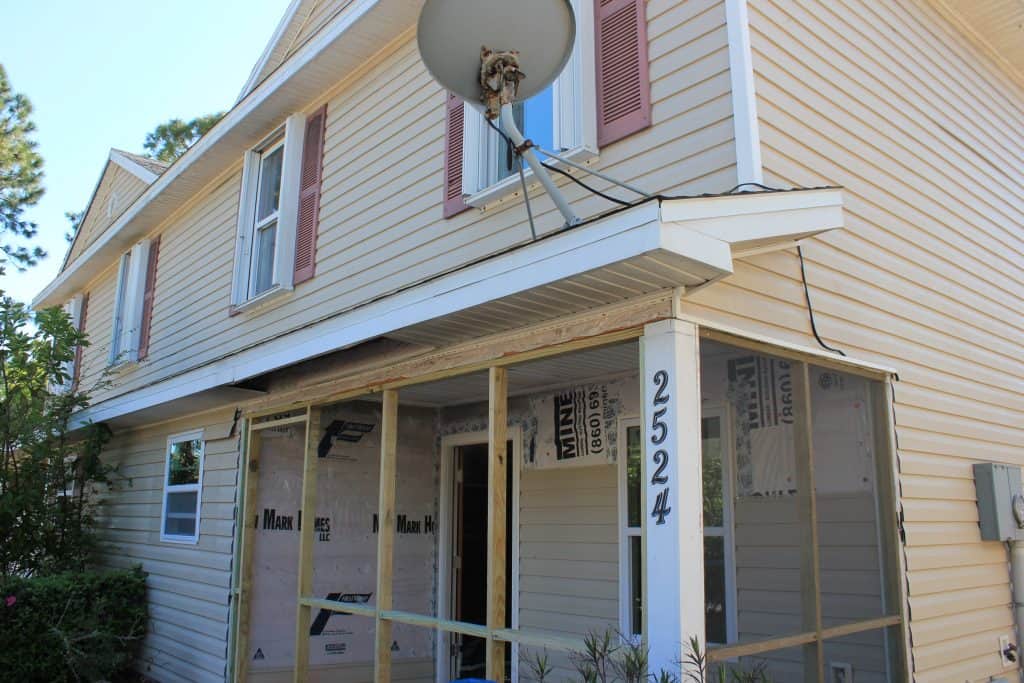 The front view of a critical home repair project being repaired by Beaches Habitat and volunteers.