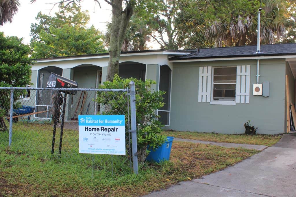 The front façade of a house receiving repairs through the Senior Repair program at Beaches Habitat.