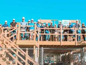 Group of people in hard hats on construction site