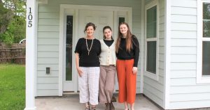 Johnson Family Outside of their Habitat Home
